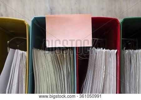 Thick Folders With Documents, On Which A Sticker For Text Is Attached. Records Management. Accountin