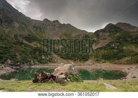 View Of An Alpine Glacier Lake Over The Top Of Italian Alps. A Secret Place Of Dolomites. Italy