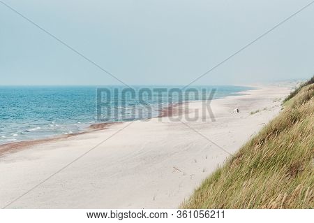 Sandy Beach And A Blue Sea. Baltic Sea, Nida, Lithuania.
