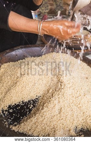 Preparing Couscous In M'hamid El Ghizlane.