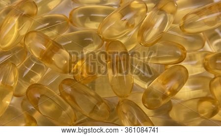 Vitaminen Omega 3 Fish Oil In Capsules On White Background.