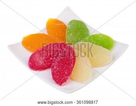 Multi-coloured Sweet Pineapple Succade Slices On White Background