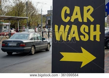Bucharest, Romania - April 13, 2020: An Advertisement For A Car Wash Is Seen On A Street In Buchares