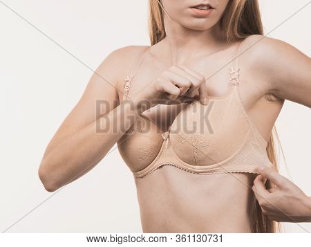 Female Wearing Too Big Bra, Wrong Size