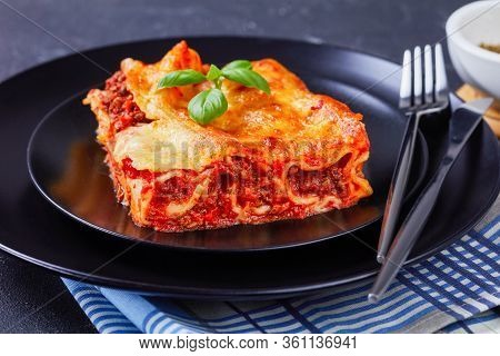 Restaurant Portion Of Stuffed Pasta Manicotti With Beef Bolognese Sauce And Mozzarella Cheese On Top