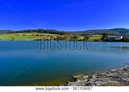 Spring Sun Walk Around A Large Lake In The Czech Republic.