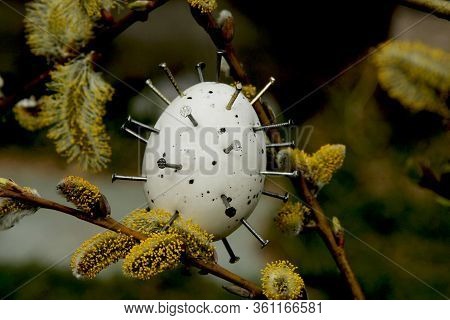 Easter Eggs With Corona Virus Covid19 For Easter Holidays Decoration. Covid-19 Protection, With Nail