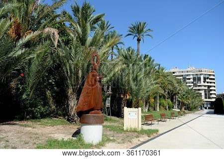 Elche, Spain - September 20, 2018:sculpture Of A Clergyman At A Municipal Park In The City Of Elche.