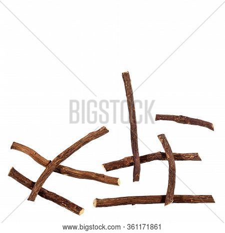 Close Up Of Ayurvedic Herb Liquorice Root,licorice Root, Mulethi Or Glycyrrhiza Glabra Root On A Woo