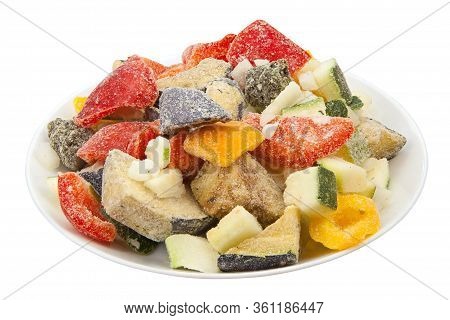 Frozen Vegetables Gorse Or Tomatoes Corn Peas Bell Peppers Carrots On A Plate
