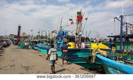 Royapuram, Tamil Nadu, India - January 01, 2019: Men With Indian Fishing Boats And Various Equipment