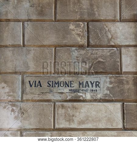 Bergamo, Italy, October 2016 - Street Sign Of Via Simone Mayr In The Ancient City Of Bergamo, Italy
