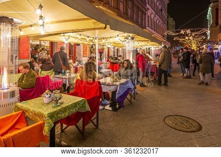 People Enjoying The Colorful Budapest Christmas Maekets, Hungary