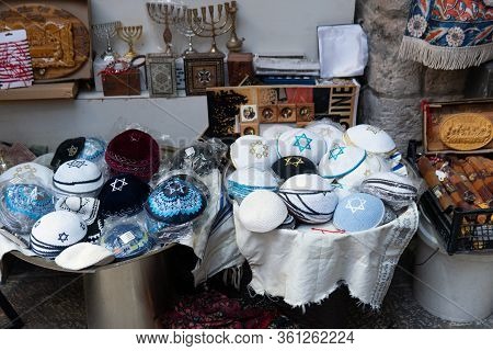 Jerusalem, Israel - November 26, 2019: Jewish Kippas And The Other Souvenirs On The Market