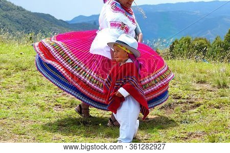 Cuenca, Ecuador-november 25, 2018: The Boy Participant Of Group Folk Dancers Performance Outdoors Tr