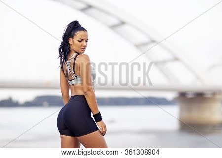 Portrait Of Fitnes Young Girl With Dark Hair