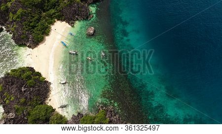 Travel Concept: Tropical Sand Beach And Turquoise Water View From The Top. Lahos Island, Caramoan Is