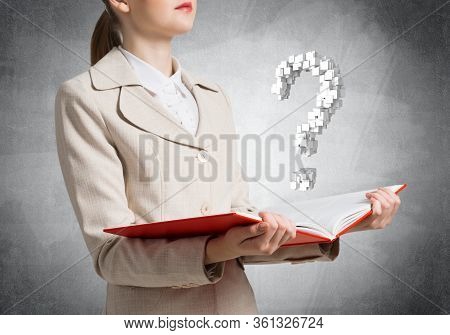 Attractive Woman Holding Open Notebook With Question Mark. Business Consultation And Legal Assistanc