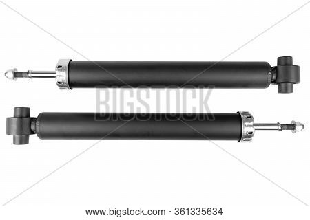 Pair Car Shock Absorber Isolated On White Background. New Auto Shock Absorber From A Car On A White