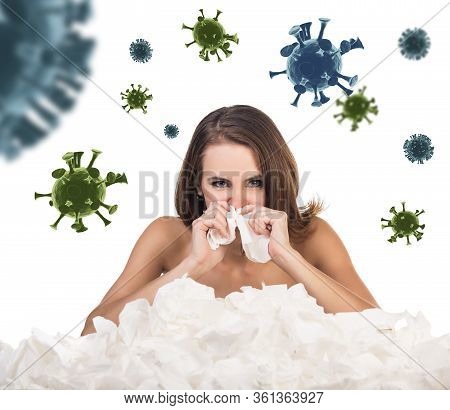 Young Woman With A Lot Of Hankys Among Coronavirus Cells. Isolated On White Background.