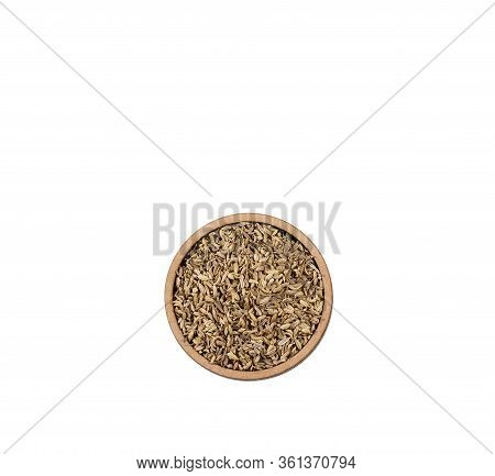 Fennel Seeds In A Small Wooden Bowl - Foeniculum Vulgare