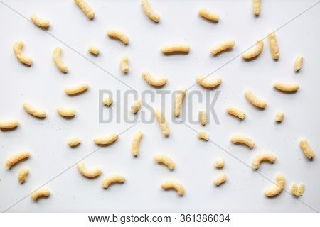 Sweet Corn Sticks Scattered On White Background Unorganized Top View