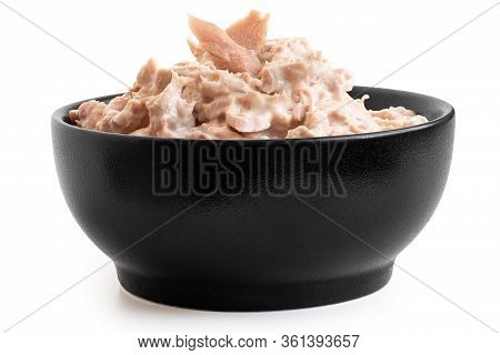 Tuna Mayonnaise With Tuna Flake Garnish In Black Ceramic Bowl Isolated On White. Low Angle.