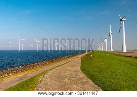 Windmill Park Westermeerdijk Netherlands, Wind Mill Turbine With Blue Sky In Ocean, Green Energy