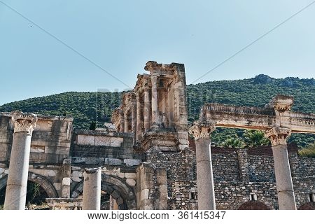 The Ruins Of Celsus Library In Ephesus At Sunny Evening Sun. Beautiful Light Of The Old Ancient Rock