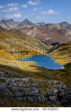 Lake Of Lauzanier In Val De L'ubayette, In The Mountains Of Mercantour National Park, Between France