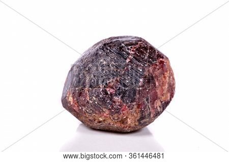 Macro Of A Mineral Garnet Stone On A White Background