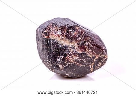 Macro Of A Mineral Garnet Stone On A White Background