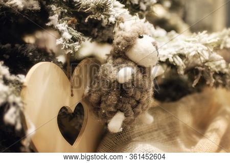 Sheep Shaped Christmas Decoration On A Flocked Tree
