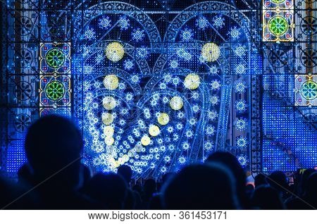 Cuneo, Italy - July 12, 2019: Crowd Looking A Light And Music Performance At Night During Cuneo Illu