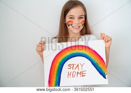Girl With Blond Hair Drew A Rainbow And A Poster Stay Home. Flashmob Chasetherainbow.