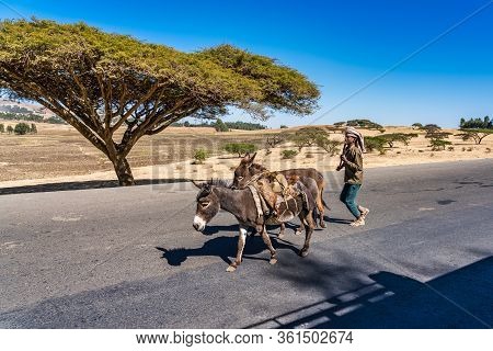Gondar, Ethiopia - Feb 07, 2020: Ethiopian People On The Road From Gondar To The Simien Mountains, N