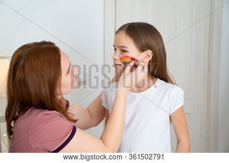 Redhead Mom Draws The Blonde Daughter Of The Rainbow On Her Face. Stay Home. Flashmob Chasetherainbo