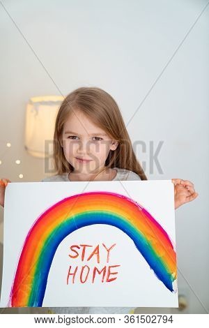 Child With Blond Hair Drew A Rainbow And A Poster Stay Home. Flashmob Chasetherainbow.