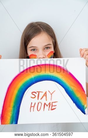 Stay Home. Teen Girl With Blond Hair Drew A Rainbow And A Poster. Flashmob Chasetherainbow.