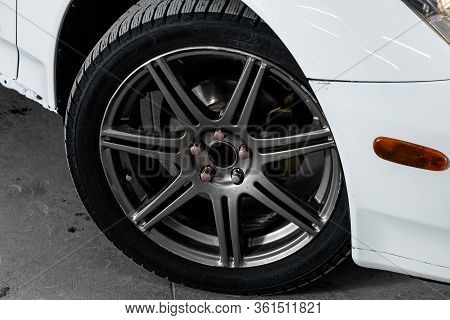 Novosibirsk/ Russia - April 11, 2020: Toyota Celica, Car Wheel On White  Car - Close Up