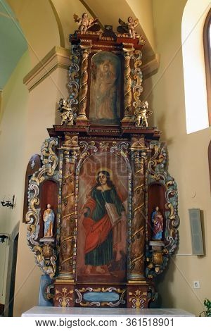 LAZ, CROATIA - JULY 14, 2014: St. John the Evangelist altar at St. Andrew's Church in Laz, Croatia