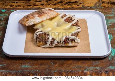 Ciabatta Baguette Sandwiches With Beef, Cheese,  And Vegetales.