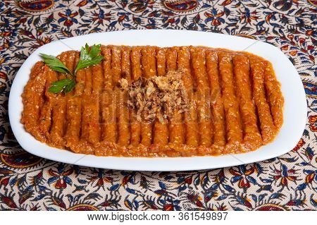 Iranian Food Called Muhammara Appetizer Of Peppers And Nuts Close-up.