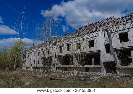 Abandoned Construction Site Of A Residential Complex. Skeletons Of Apartment Buildings. Construction
