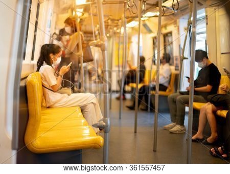 Bangkok, Thailand- April 4, 2020: People Wearing Surgical Mask For Protect And Social Distancing For