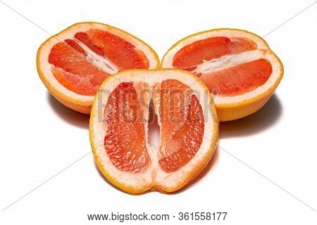 Grapefruits On White Background. Pieces Of Grapefruits And Half Grapefruits, With Little Shadow. Gro