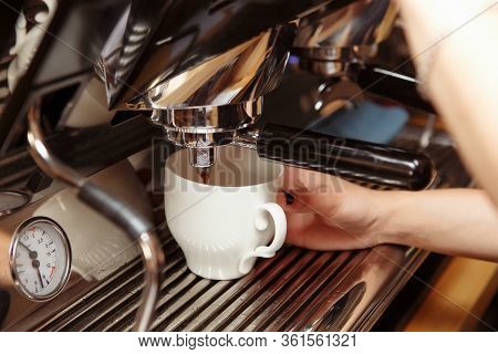Espresso Machine Pouring Coffee In Cups. Barista Making Fresh Coffee Latte.