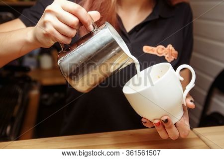 Barista Making Fresh Coffee Latte. Barista Paints A Picture On Coffee, Latte.