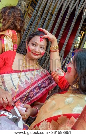 Women Participate In Sindur Khela At A Puja Pandal On The Last Day Of Durga Puja At Baghbazar Sarboj