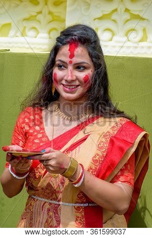 Women Participate In Sindur Khela At A Puja Pandal On The Last Day Of Durga Puja At Baghbazar Sarboj